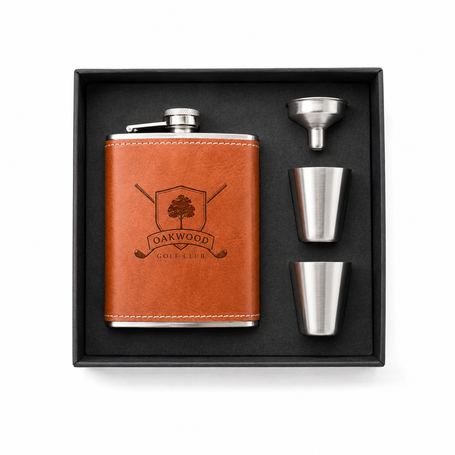 Custom logo flask gift set with brown leather-look flask, two shot cups, funnel, and black presentation box